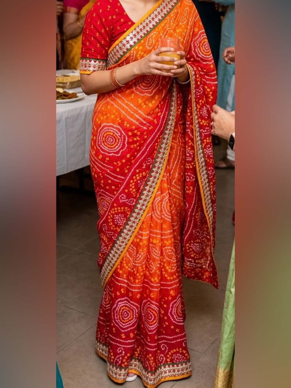 Red Flowing Women's Saree with Bandhani-Inspired Print
